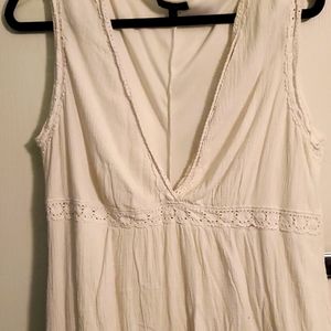 White linen dress with under bust and hem detailing